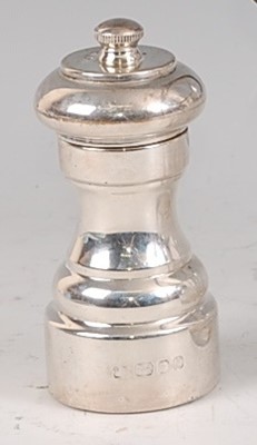 Lot 67 - A 1970s silver pepper mill, of plain knopped...