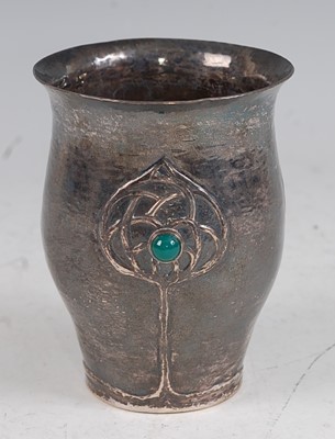 Lot 91 - An Art Nouveau silver hammered beaker, having...