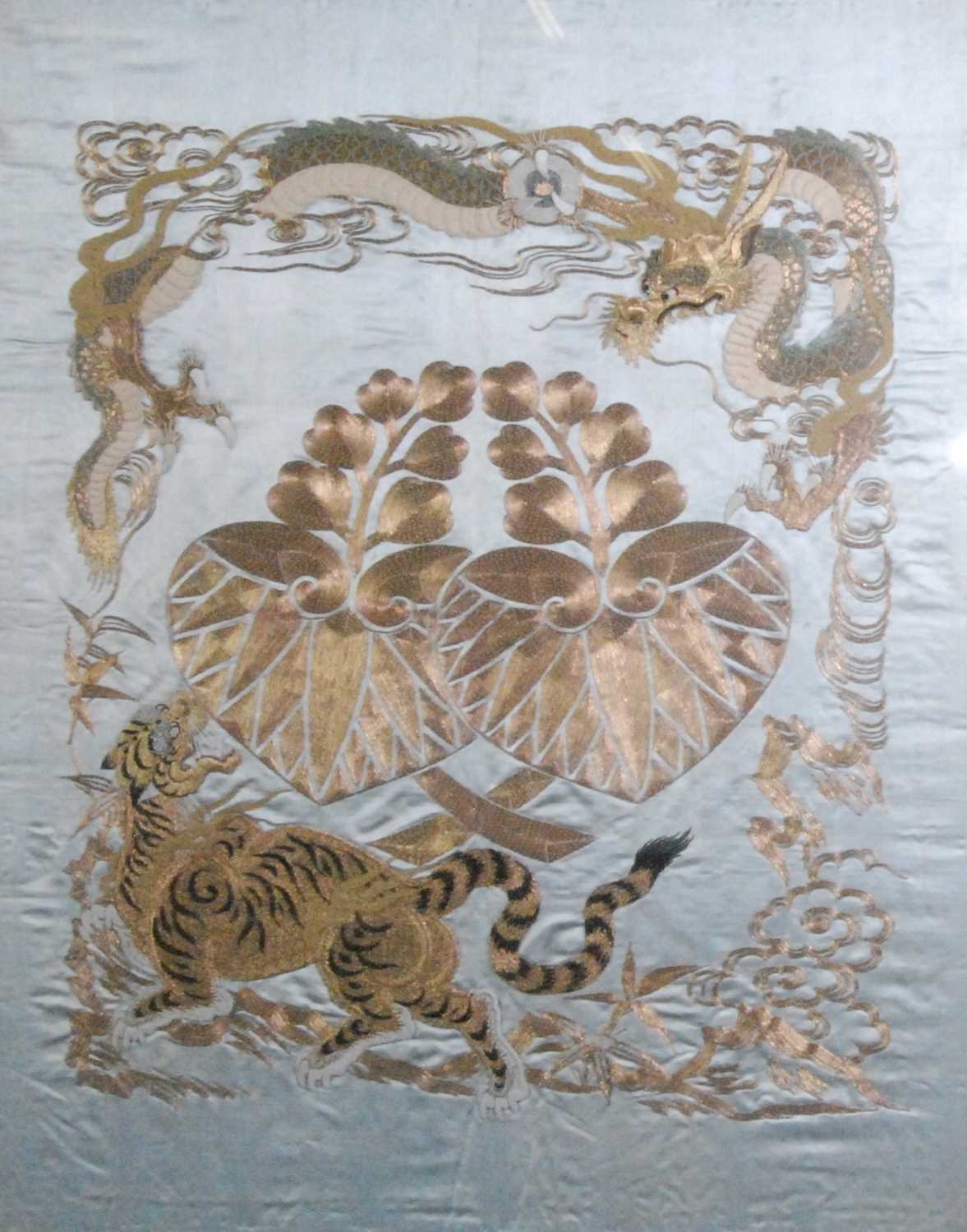 Lot 1359 - A Chinese embroidery and gold thread on silk...