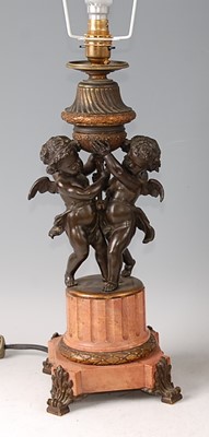 Lot 1326 - *A circa 1900 French bronze and marble table...