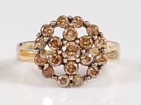 Lot 1271 - A 9ct yellow gold diamond circular cluster...