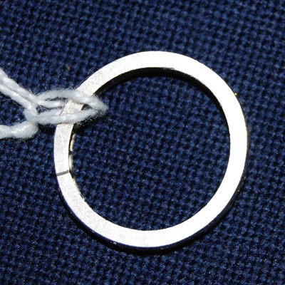 Lot 1272 - A white metal full hoop eternity ring,...