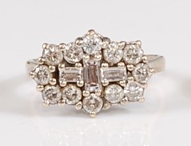 Lot 1269 - An 18ct yellow and white gold diamond oblong...