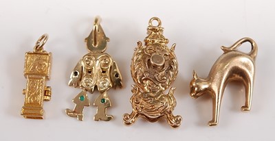 Lot 2640 - Four assorted 9ct yellow gold charms,...