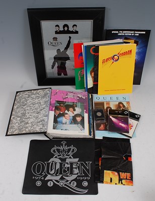 Lot 670 - Queen, a collection phone cars each in folders...