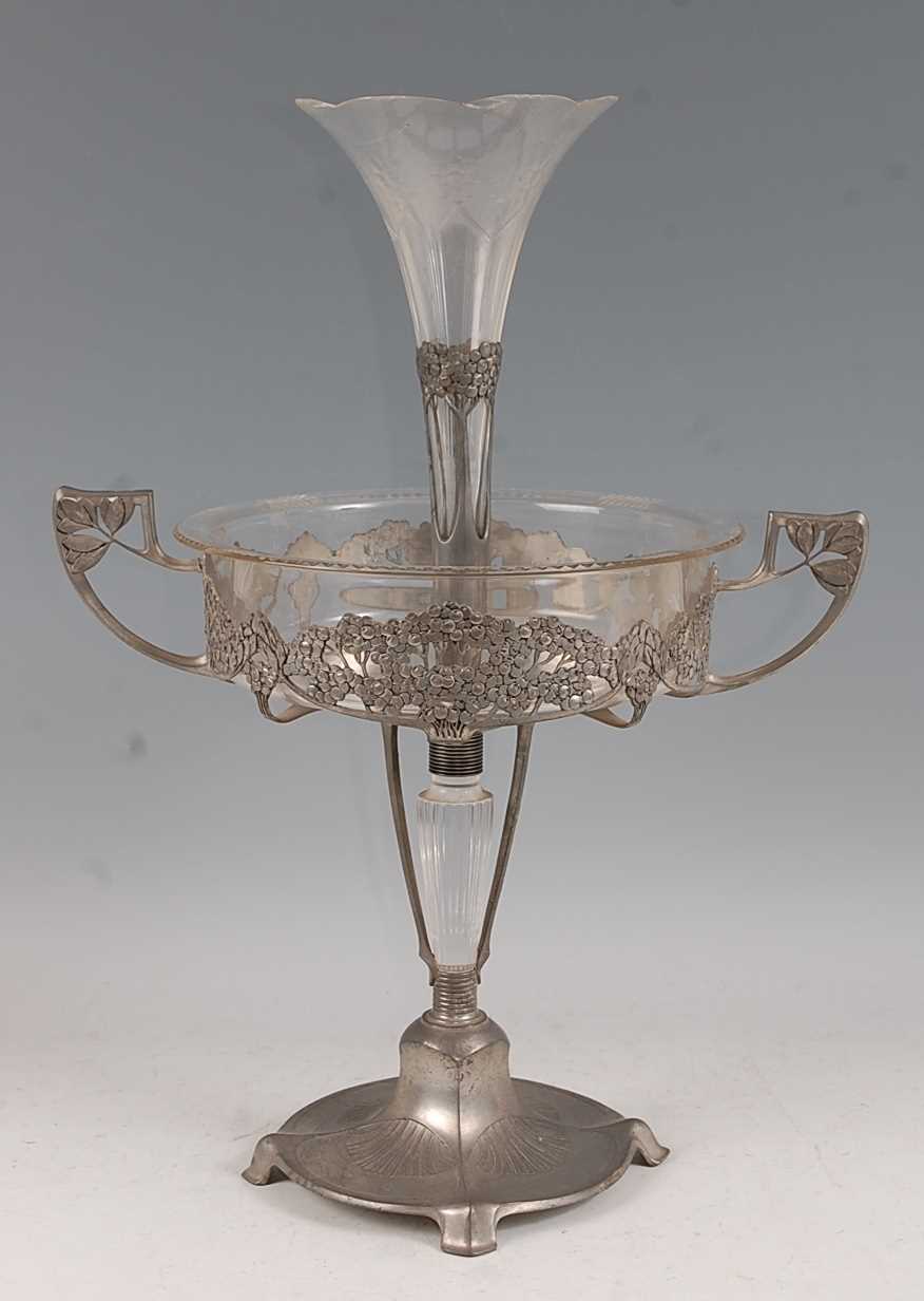 Lot 202 - An Art Nouveau pewter and clear glass...