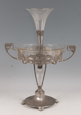 Lot 65 - An Art Nouveau pewter and clear glass...