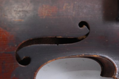 Lot 114 - An Italian violin, having a two piece maple...