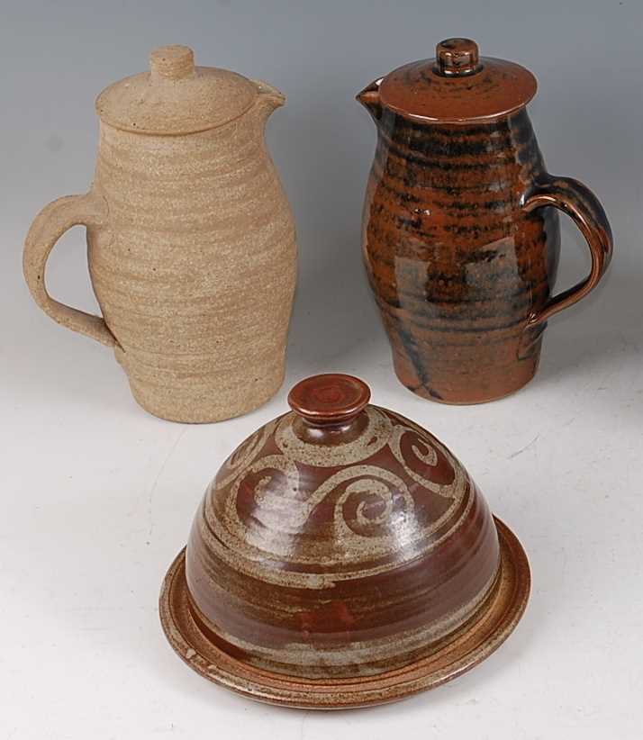 Lot 48 - A studio pottery Tenmoku glaze hot water jug...