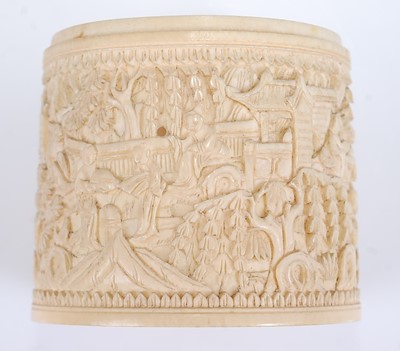 Lot 1363 - A circa 1900 Chinese relief carved ivory wrist...