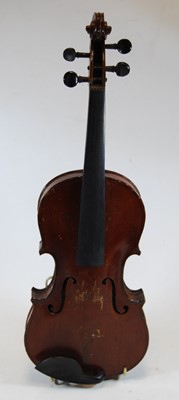 Lot 611 - A 20th century violin, having a two piece back...