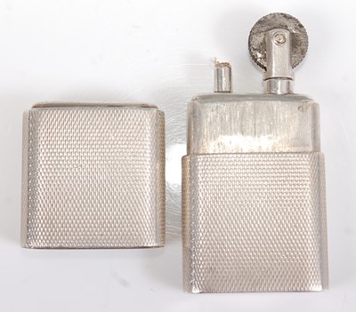 Lot 190 - A late Art Deco silver pocket cigarette...