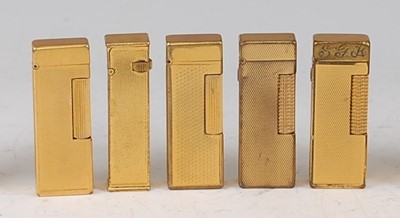Lot 192 - A collection of five various Dunhill gilt...