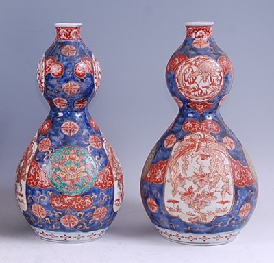 Lot 1353 - A pair of Japanese Meiji period double gourd...