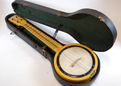Lot 618 - A 20th century four string banjolele, bearing...