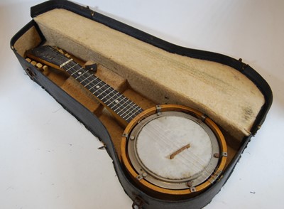 Lot 619 - A mid-20th century walnut eight string banjo,...