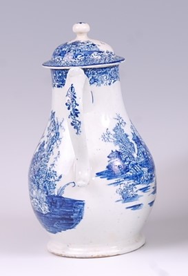 Lot 1038 - A Lowestoft porcelain milk jug and cover, blue...