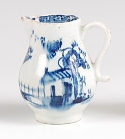 Lot 1042 - A Lowestoft porcelain sparrow-beak cream jug,...