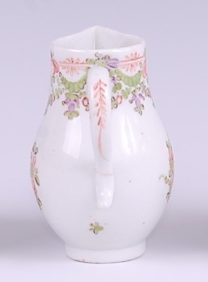 Lot 1047 - A Lowestoft porcelain sparrow-beak cream jug,...