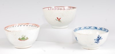 Lot 1045 - A Lowestoft porcelain tea bowl, polychrome...