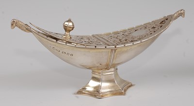 Lot 1122 - A silver gilt pedestal pot pourri, of boat...