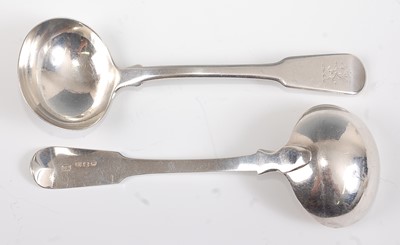 Lot 1126 - A pair of George III silver sauce ladles,  in...