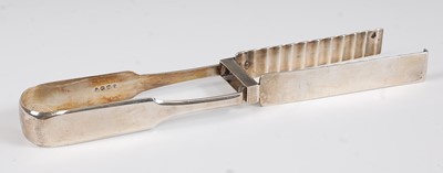Lot 1129 - A pair of George IV silver asparagus tongs, in...