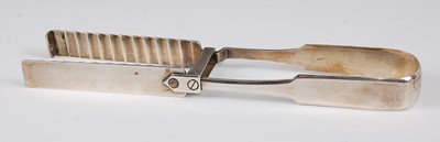Lot 1129 - A pair of George IV silver asparagus tongs, in...