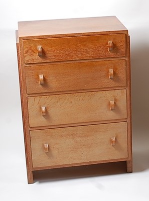 Lot 297 - An Art Deco limed oak chest, of four long...