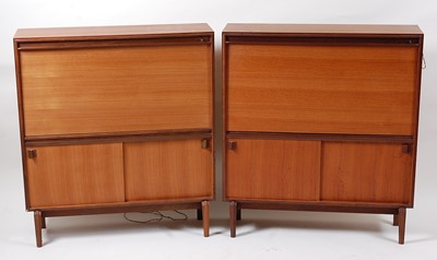 Lot 322 - A pair of 1960s Danish teak side cupboards,...