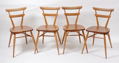 Lot 356 - A set of four 1960s Ercol blond elm barback...