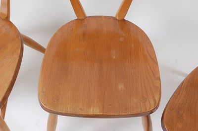 Lot 356 - A set of four 1960s Ercol blond elm barback...