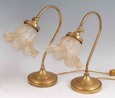 Lot 118 - A pair of Art Nouveau brass table lamps, each...