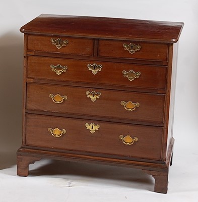 Lot 1507 - A George III mahogany squarefront chest,  the...