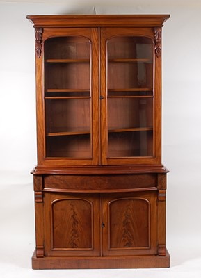 Lot 1592 - A Victorian mahogany bookcase cabinet, having...