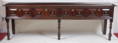 Lot 1582 - An antique joined oak dresser base, of good...