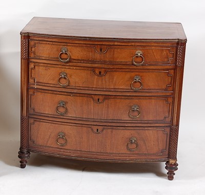 Lot 1599 - *A Regency mahogany bowfront chest, of four...