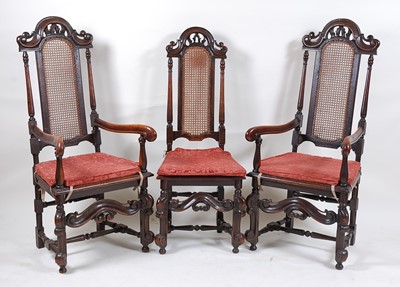 Lot 1529 - A set of eight Caroleon style ebonised oak...