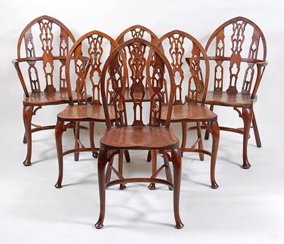 Lot 1530 - A set of six elm seat and fruitwood Windsor...