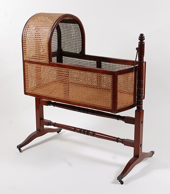 Lot 1517 - An early Victorian mahogany crib, having split...