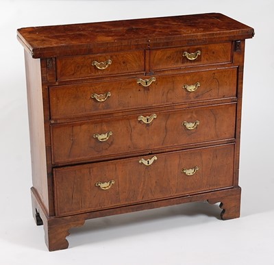 Lot 1514 - *A George II figured walnut bachelors chest,...