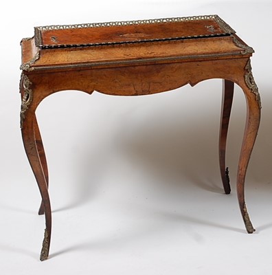 Lot 1568 - A mid-Victorian figured walnut and gilt metal...