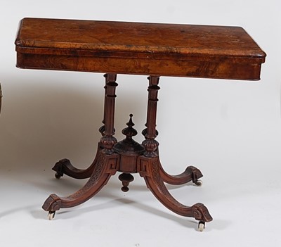 Lot 1569 - A Victorian figured walnut pedestal card table,...