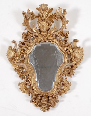 Lot 1560 - *An 18th century carved giltwood pier glass,...