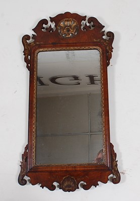 Lot 1564 - *An 18th century walnut and parcel gilt wall...