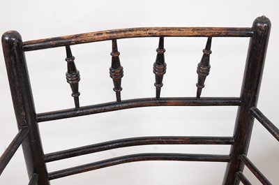 Lot 292 - An Arts & Crafts ebonised Sussex chair,...