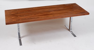 Lot 323 - A 1960s Danish rosewood and chrome long coffee...