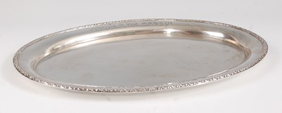 Lot 1375 - A circa 1900 Middle Eastern white metal tray,...