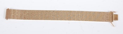 Lot 1211 - A modern 9ct gold textured link bracelet, with...