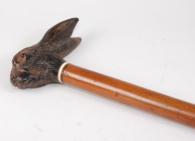 Lot 1320 - A Victorian malacca walking cane,  the handle...